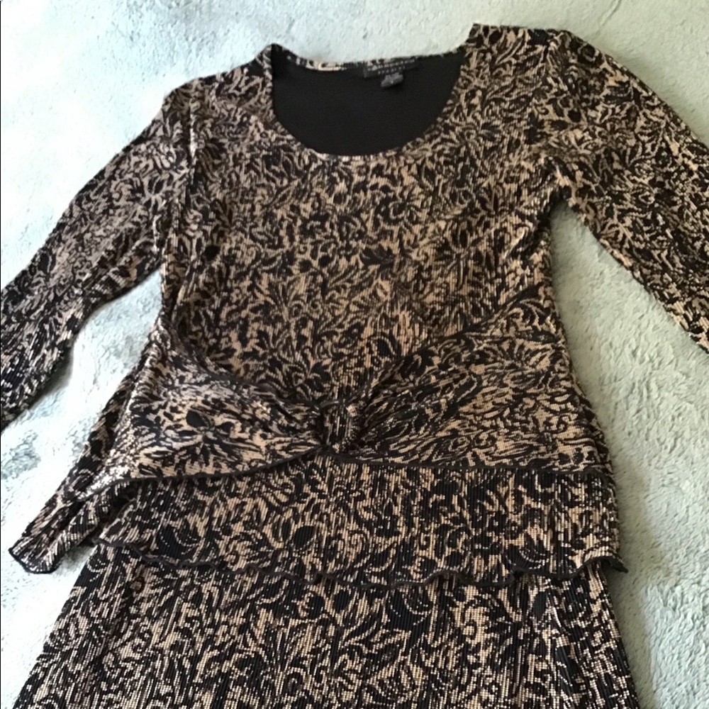 Elegant work attire versatile for evening dress
